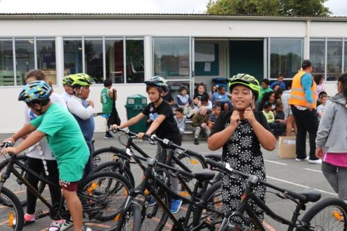 Helmets on and free school bikes